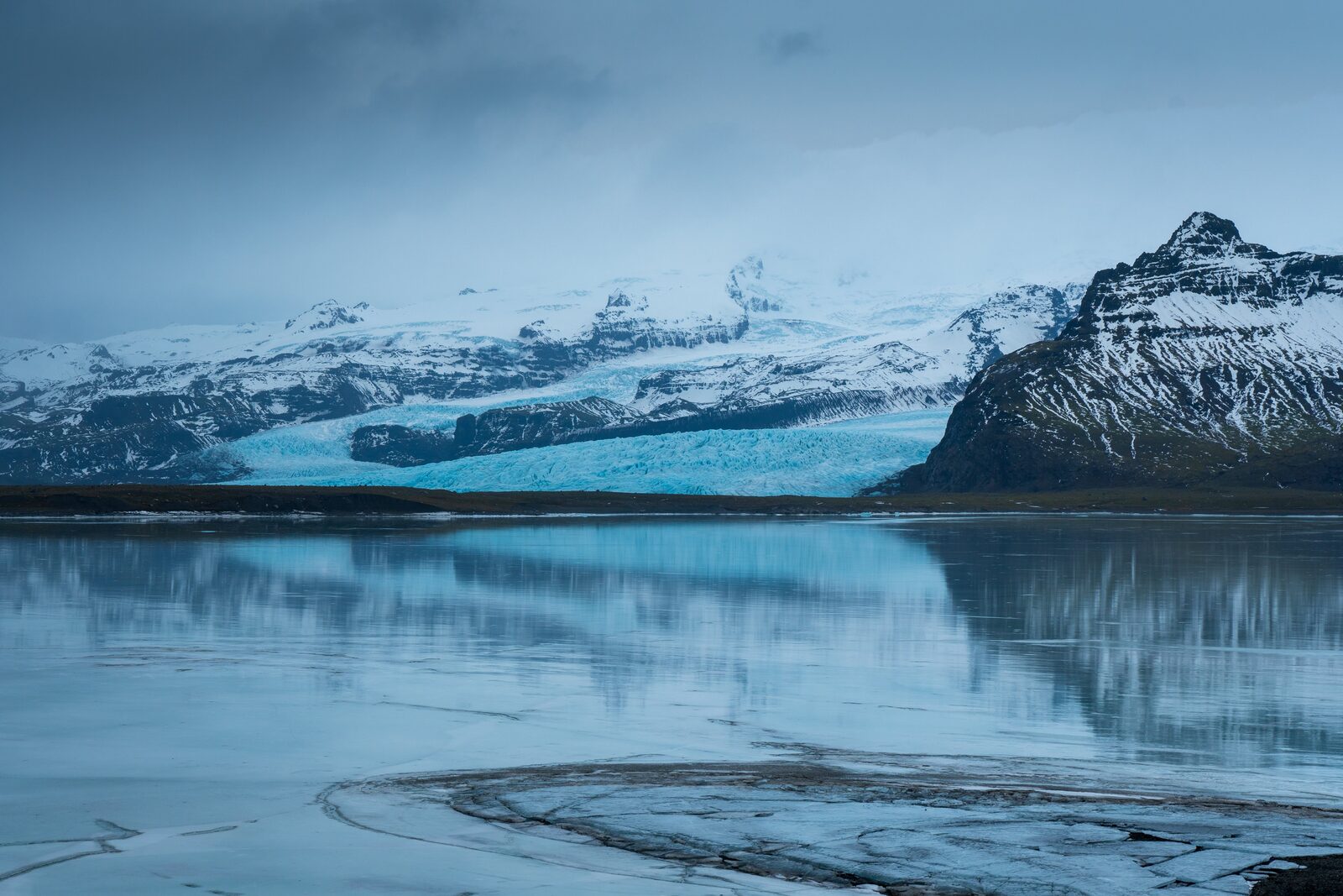 Jökulsárlón lagoon at dawn with glacier reflection