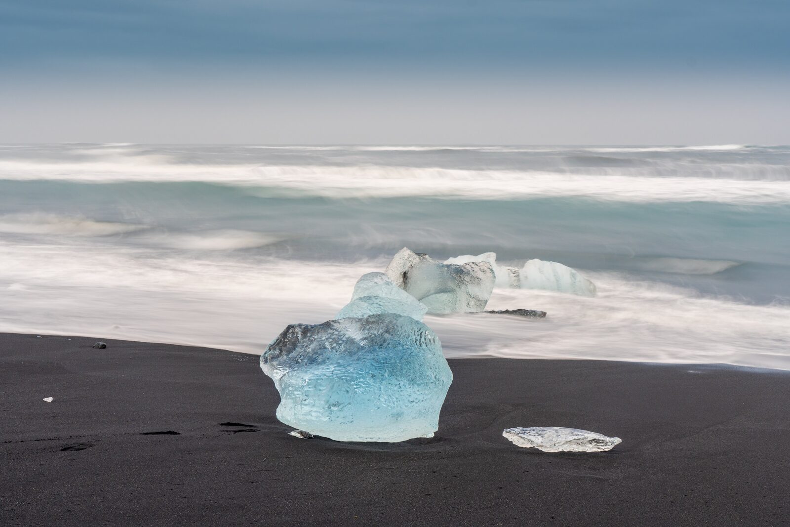 Iceberg chunks washed up on Diamond Beach black sand